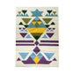 "A woven rug with geometric patterns in green, yellow, blue, and purple on a light beige background, displayed vertically."