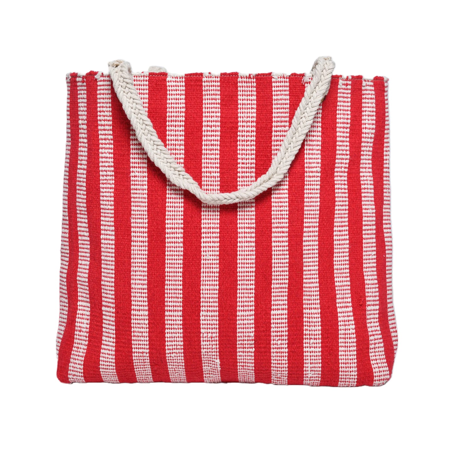 That's a stylish tote bag! The image shows a cream-colored tote bag with a woven design featuring red and pink geometric patterns. The bag has braided rope handles with wooden accents and tassels. A small brown rectangular label is visible, suggesting a brand name (partially visible as "Kilim Fi"). The overall style suggests a handcrafted, possibly bohemian or ethnic-inspired design.