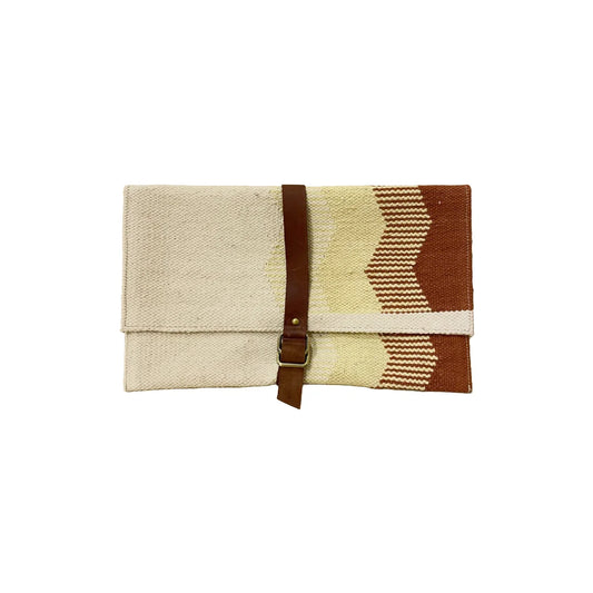 "Stylish woven clutch with a modern geometric design in neutral tones and a brown leather strap. A fashionable accessory."